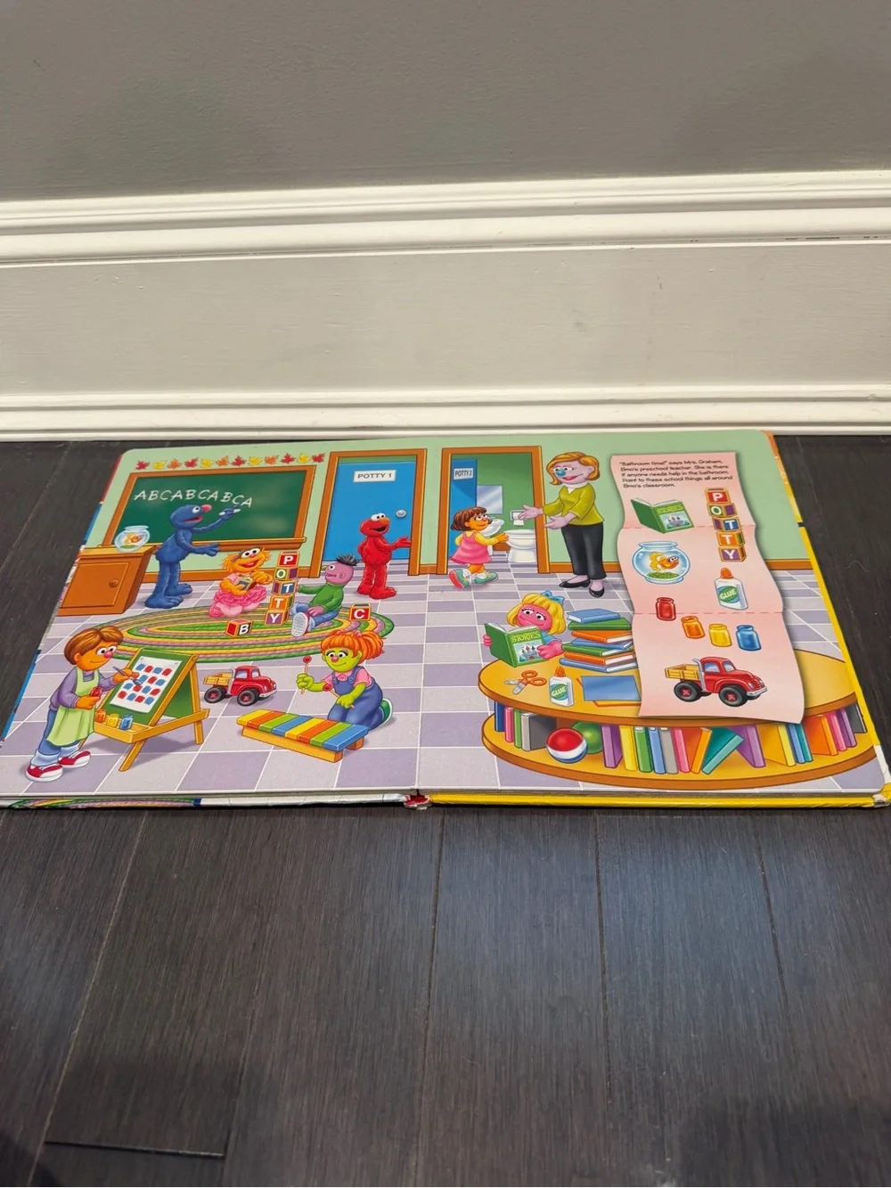 Sesame Street Elmo & Zoe XL Potty Book  Look and Find Hardcover Board Book